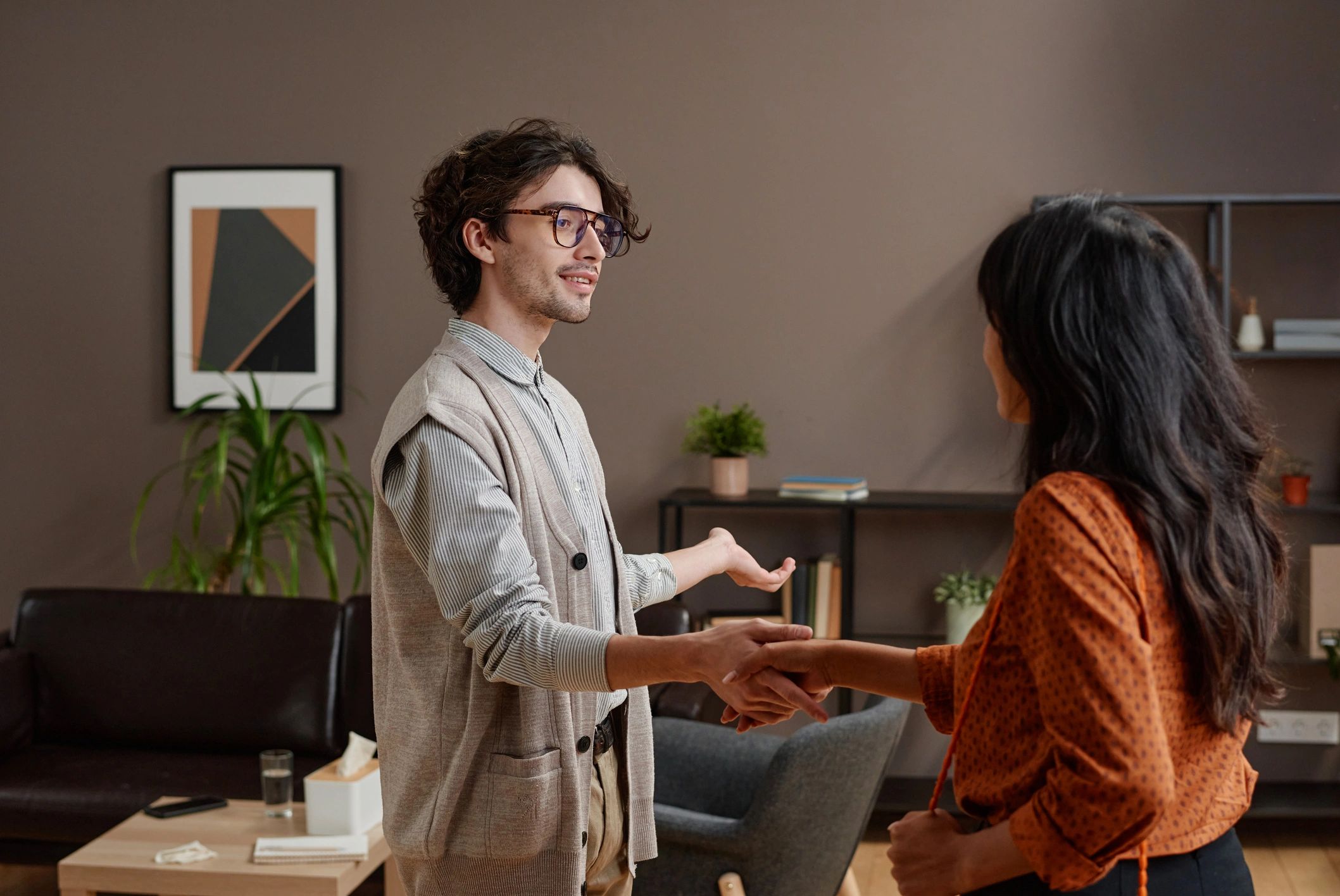 Professional client greeting in an office setting